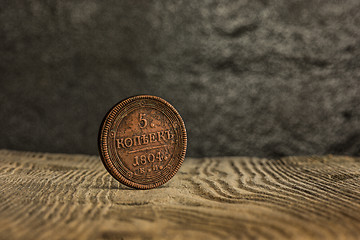 Image showing Closeup of old russian coin on a wooden background.