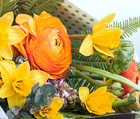 Image showing Ranunkulyus bouquet of red flowers on a white background