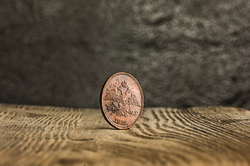 Image showing Closeup of old russian coin on a wooden background.