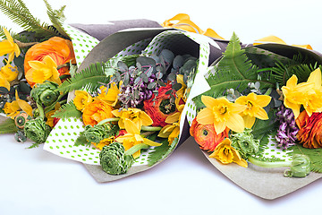 Image showing Ranunkulyus bouquet of red flowers on a white background