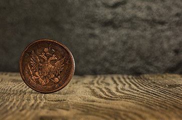 Image showing Closeup of old russian coin on a wooden background.