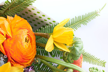 Image showing Ranunkulyus bouquet of red flowers on a white background