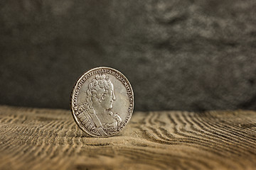 Image showing Closeup of old russian coin on a wooden background.