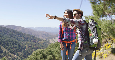 Image showing Young coupole having fun in mountains