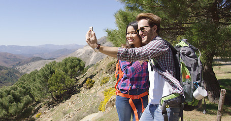 Image showing People taking selfie while hiking