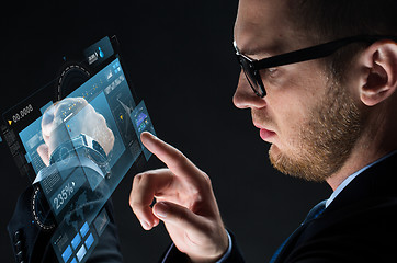 Image showing close up of businessman with smartwatch