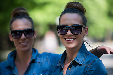 Image showing twin sister with sunglasses