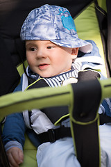 Image showing baby boy sitting in the pram