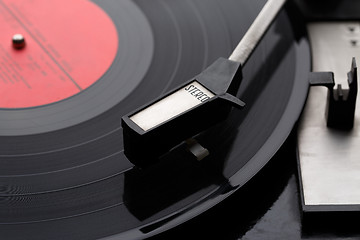 Image showing Old vinyl record with player
