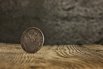 Image showing Closeup of old russian coin on a wooden background.