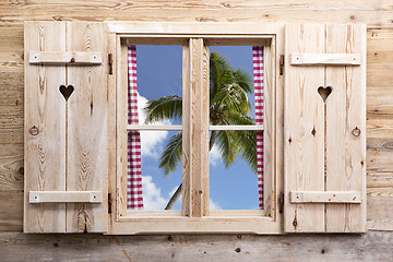 Image showing Wooden window with tropical panorama view