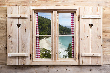 Image showing Wooden window with tropical panorama view