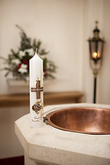 Image showing Baptismal candle on font