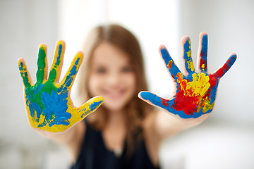 Image showing girl showing colored hands