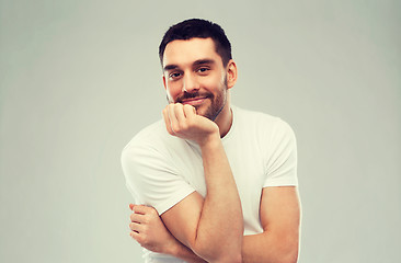 Image showing smiling man over gray background