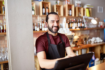 Image showing happy man or waiter at bar cashbox