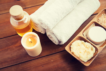 Image showing close up of natural cosmetics and bath towels