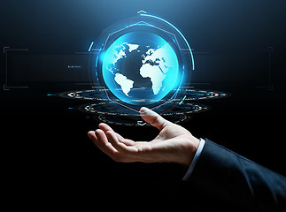 Image showing businessman hand virtual earth projection