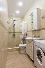 Image showing Interior of a bathroom, a combined toilet and shower