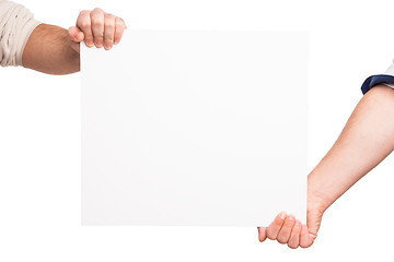 Image showing Hands holding a blank white board