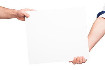 Image showing Hands holding a blank white board