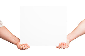 Image showing Hands holding a blank white board