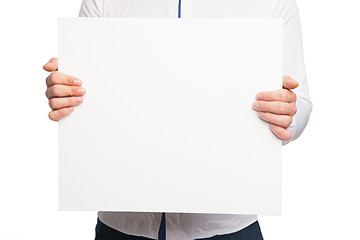 Image showing close up of man hands showing white blank board