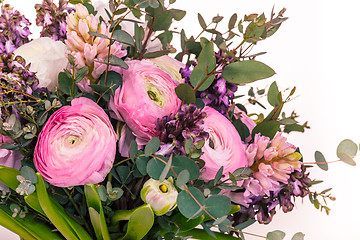 Image showing Ranunkulyus bouquet of red flowers on a white background