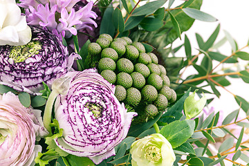 Image showing Ranunkulyus bouquet of red flowers on a white background