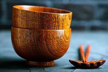 Image showing wood bowl with wooden chopsticks