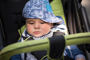 Image showing baby boy sitting in the pram