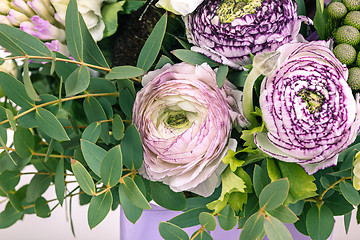 Image showing Ranunkulyus bouquet of red flowers on a white background