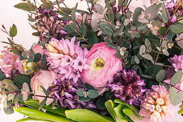 Image showing Ranunkulyus bouquet of red flowers on a white background