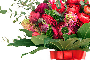 Image showing Ranunkulyus bouquet of red flowers on a white background