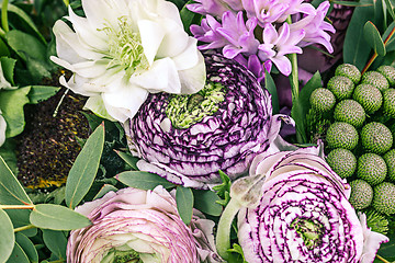 Image showing Ranunkulyus bouquet of red flowers on a white background