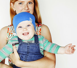 Image showing young beauty mother with cute baby, red head happy modern family