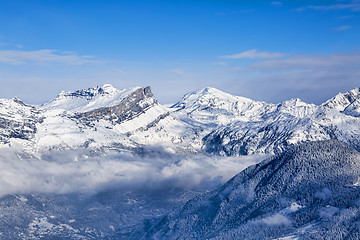 Image showing Mountain Peaks Above the Clouds