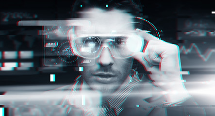 Image showing man in virtual reality or 3d glasses with glitch