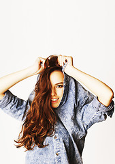 Image showing young cheerful brunette teenage girl on white background