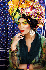 Image showing beauty bright woman with creative make up, many shawls on head l