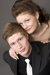 Image showing Portrait of a young beautiful couple embracing.