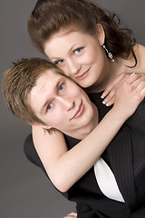 Image showing Portrait of a young beautiful couple embracing.