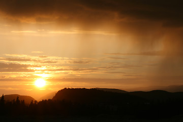 Image showing sunset and rain