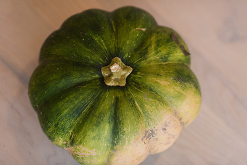 Image showing pumpkin on a wooden table