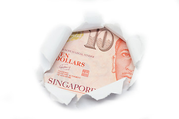 Image showing Singapore currency peeking through white paper