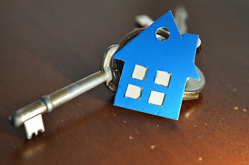 Image showing Bunch of keys with house shaped cardboard 