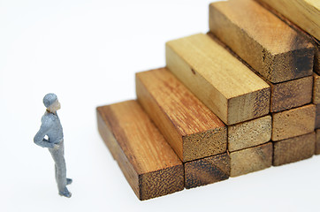 Image showing Way to success with  businessman and wood block step