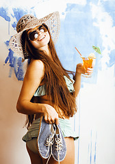 Image showing cute bright woman in sunglasses and hat with cocktail in bikini 