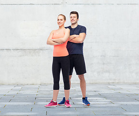 Image showing happy sportive man and woman