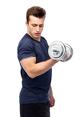 Image showing sportive young man with dumbbell